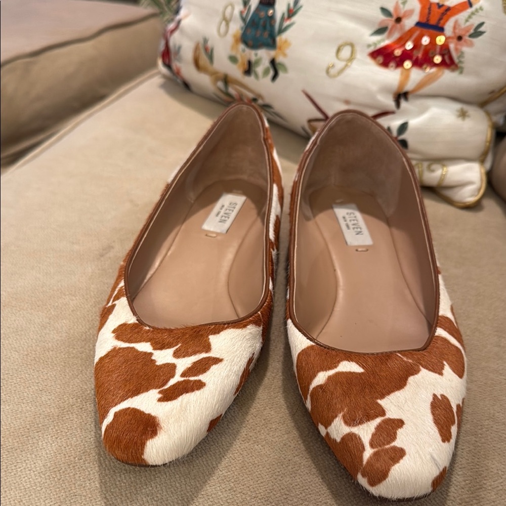 Elegant Cow Print Flats in Brown and White